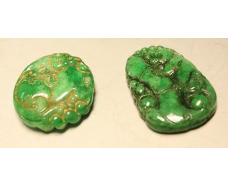 A jade coloured stone tablet/pendant; another (2)