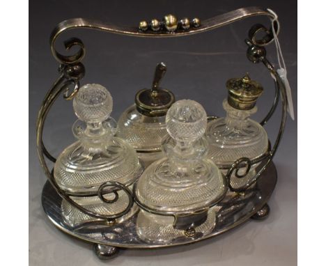 A Victorian EPNS Art Nouveau cut glass cruet set on stand, Mappin and Webb, Sheffield 