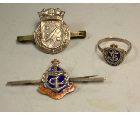 A Royal Navy silver and enamel sweetheart brooch; a similar silver ring; a Mine Sweepers brooch (3)