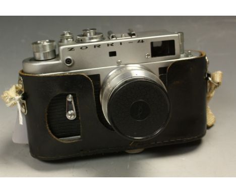 A vintage Zorki-4 SLR camera, serial no 69946935, with Jupiter 8 2/50 lens, serial No 017836 in a leather housing, c.1960