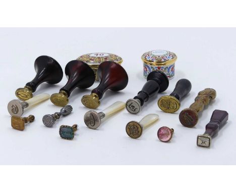 A collection of 19th century and later desk seals, to include bloodstone handled example, length 6cm; together with two Staff