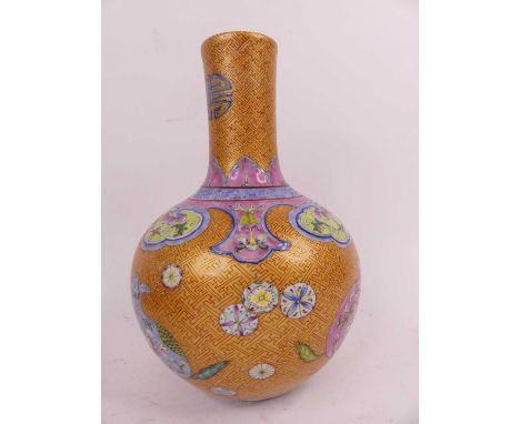A Chinese porcelain tianqiuiping vase enamel decorated with flowers, height 27cm
