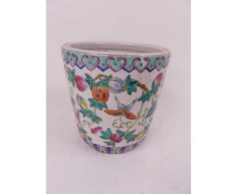 A Chinese porcelain jardiniere, enamel decorated with fruit and flowers, height 20cmDiameter 21cm.