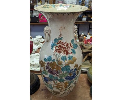 A Japanese Satsuma floor vase, enamel decorated with flowers, height 56cm (a/f)