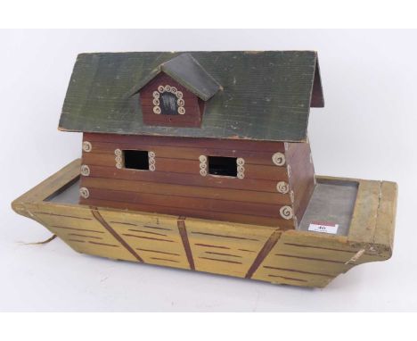 A late 19th/early 20th century painted pine model of Noah's Ark, width 48cmWith light scuffs and some flakes to the paint as 