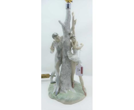A Lladro figural porcelain table lamp, 43cm height including fittingsAppears to be intact.