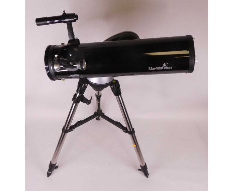 A Skywatcher Lunar Telescope, mounted upon a tripod, height 97cm