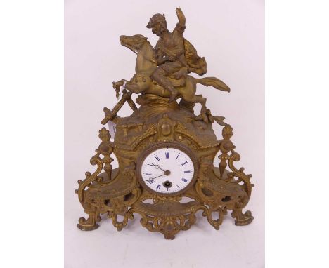 A 19th century French gilt spelter mantel clock, the enamel dial showing Roman numerals, height 35cm