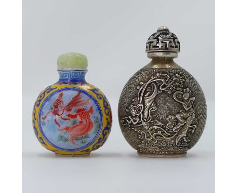 A Chinese simulated jade snuff bottle, decorated with goldfish; together with a metal example (2)