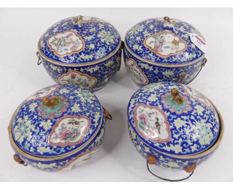 A set of four Chinese famille rose porcelain pots, each enamel decorated with figures within cartouches upon a blue lotus gro