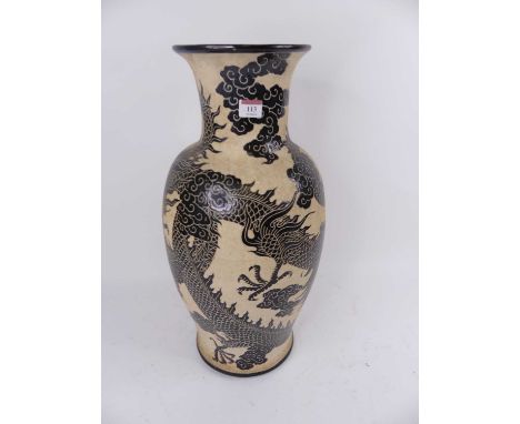 A Chinese pottery vase, enamel decorated with a dragon, height 58cm