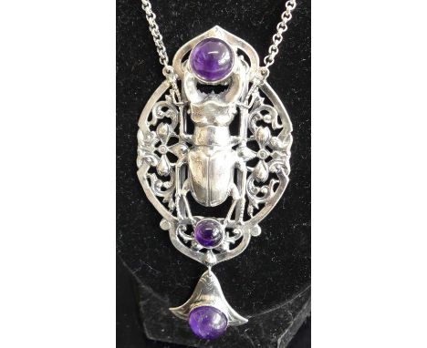 A reproduction white metal cabochon amethyst set scarab beetle pendant, of good size, 8.5cm, on belcher link neck chain