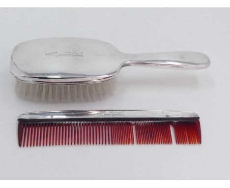 A Gorham silver two-piece dressing table set, monogrammed ALR, comprising  brush and comb