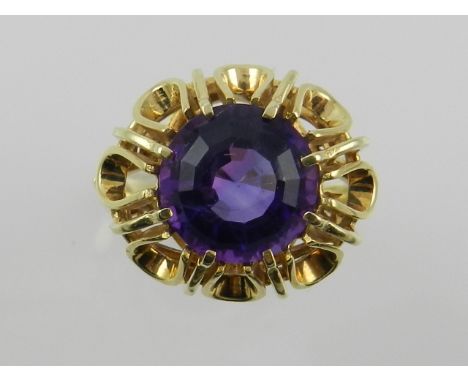 A 14ct yellow gold ring, set with amethyst stone.