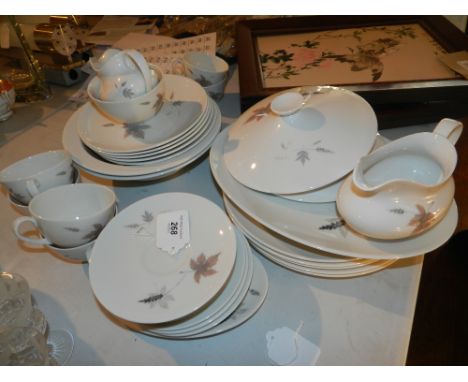 A Royal Doulton tumbling leaves part dinner / tea service to include dinner plates, side plates, tureens, serving plates, sau