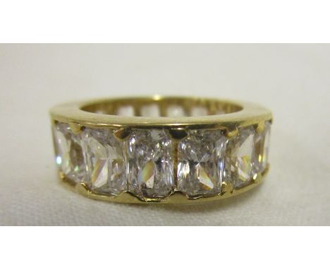 Heavy gold stone set full eternity ring