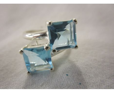 Silver blue topaz ring