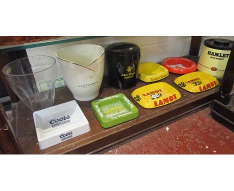 Shelf of retro advertising ashtrays &amp; ice buckets