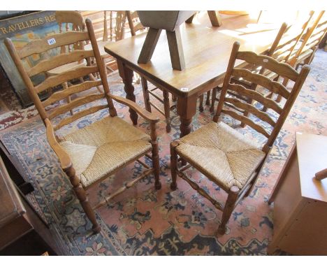 Set of 8 ladder back rush seated dining chairs to include 2 carvers
