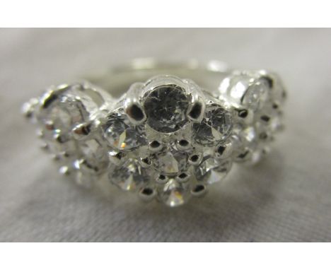 Silver triple cluster ring