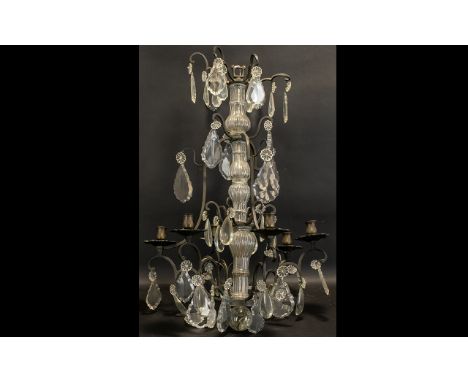 A French Six Branch Chandelier Light Fitting with iron arms and crystal droplets. Total height 30 inches.