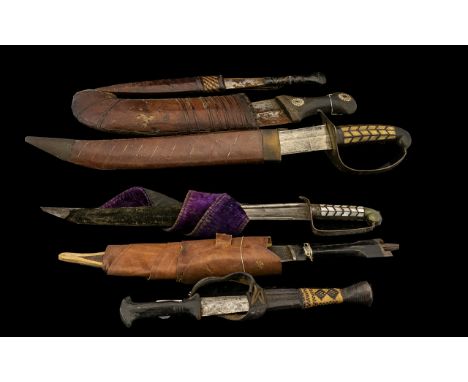 Mixed Lot Of Knives To Include A Malayan Bade-Bade With Scabbard, Length 11 Inches. 2 African Leather Clad Daggers, Two Middl