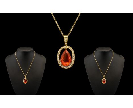 Ladies Stunning and Attractive Fire Opal and Diamond Set Pendant with Attached 18ct Gold Chain. Marked 750 - 18ct. The Pear S