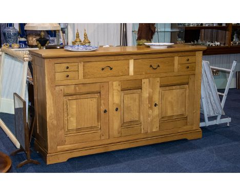 A Large French Oak Contemporary Light Oak Sideboard made in the traditional style pegged and dovetail. A Combination of two l