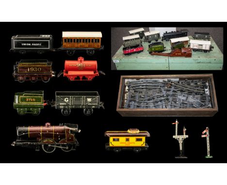 Early 20th O Gauge Tin Plate Clockwork Train Set complete in a wooden hinged chest with lift out shelf containing a quantity 