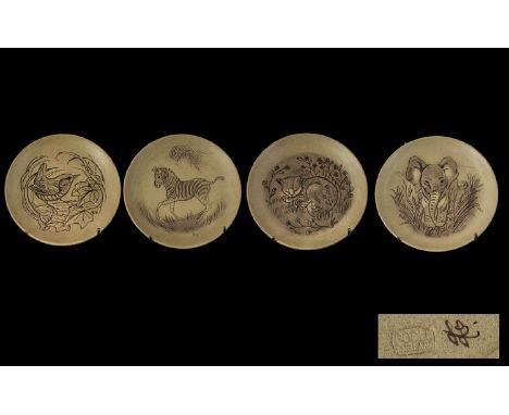 Four Poole Pottery Animal Plates designed by Barbara Linley Adams, comprising a Zebra, an Elephant, a Wren and a Cat.  13cm d