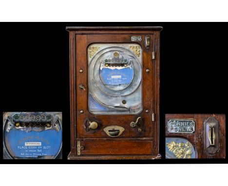 Early - Mid 20th Century Allwin De Luxe Coin Slot Arcade Machine  Rectangular form with Oak case., glazed panel and silver to