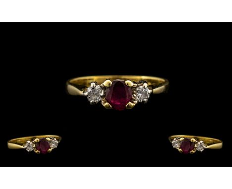 Ladies 18ct Gold 3 Stone Ruby &amp; Diamond Ring.  Pleasing design.  Ring size J-K.  Marked 750 - 18ct. All aspects of condit