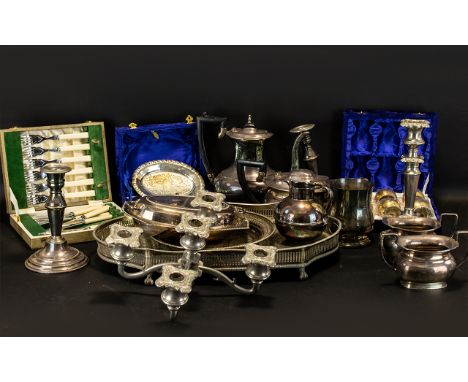 A Quantity Of Silver Plate Items. Comprising, Four Piece Tea Set, Tankard, Candlesticks, Candelabra, Trays, Boxed Salt And Pe