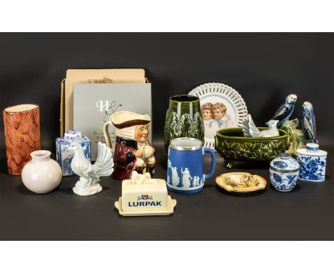 A Box of Assorted Pottery to include Poole pottery, Jenna Budgie Figures, a pair of ribbon plates, a Lurpak butter dish, Roya