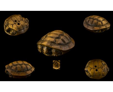 Japanese Meiji Period Well Carved Boxwood Netsuke of a turtle.  Signed to underside.  Meiji period 1864-1912.  1.5" - 3.75 cm