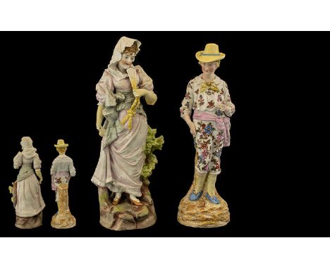 Pair of German Bisque Porcelain Figurines depicting a country gentleman in a floral suit and straw hat, and a lady in a pearl