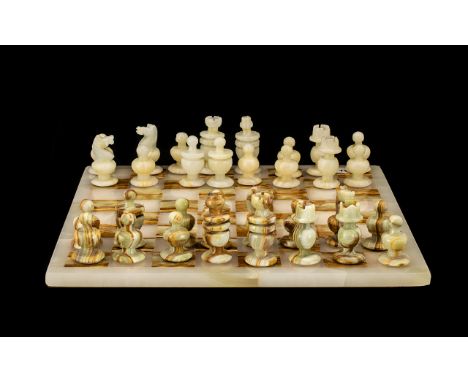 Marble Chess Set.  Cream marble chess board with matching chess pieces.  Please see images.