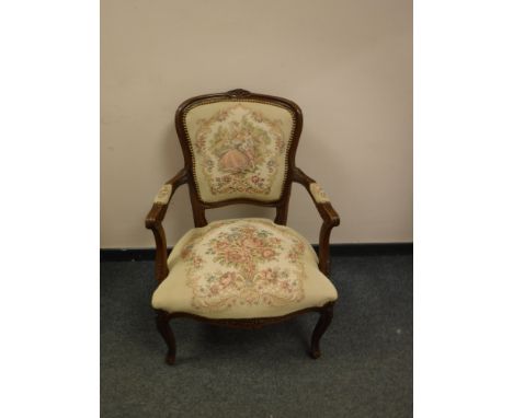 A continental tapestry seated armchair, width 63cm 