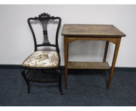 An antique mahogany bedroom chair, an early twentieth century oak occasional table with under shelf