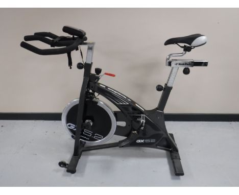 A Nordic track spinning bike with manual