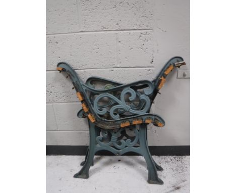 A pair of cast iron bench ends 