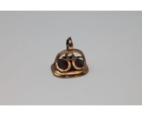 A Georgian gold mounted intaglio seal bearing initials R A