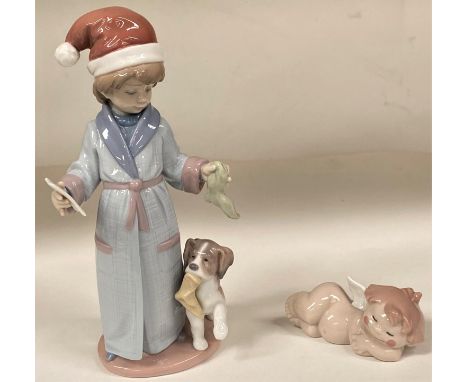 A Lladro figure of a Boy with a Puppy in Christmas 6166 &amp; a small figure of a Nao cherub.