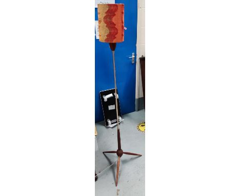 A mid 20th century teak and brushed metal standard lamp with three splay feet height 162cm with original shade 