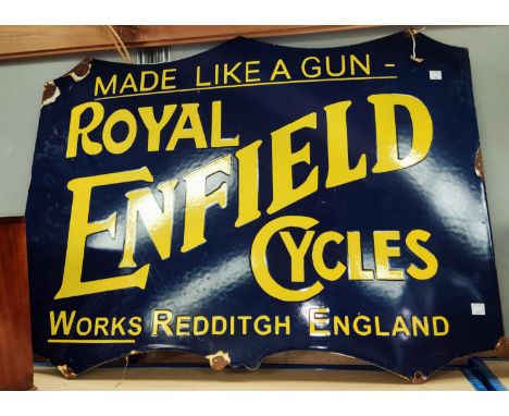 A mid 20th century enamel Royal Enfield cycles sign "Made like a gun" in royal blue with yellow lettering,&nbsp; 45 x 76 cm 