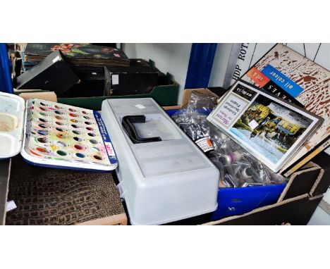 An artist's easel and a good quantity of artists materials 