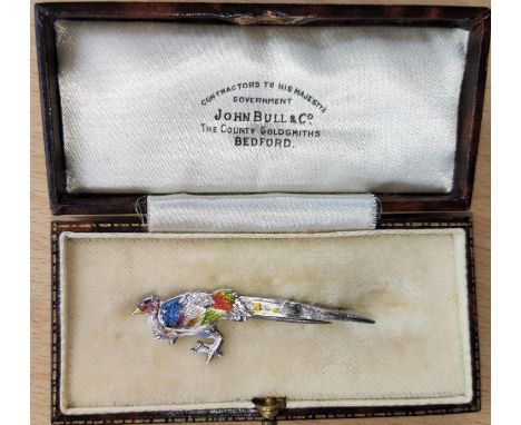 A Chinese white metal and enamel bird brooch, character mark to the back (some enamel loss) 