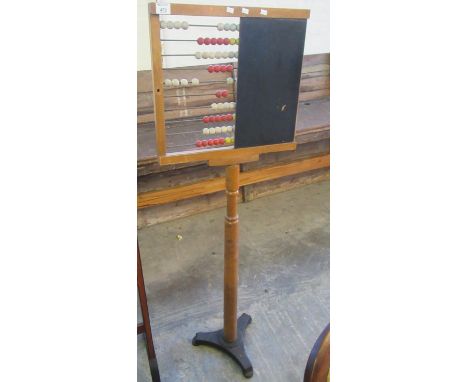 Vintage abacus on tripod stand.(B.P. 21% + VAT) 