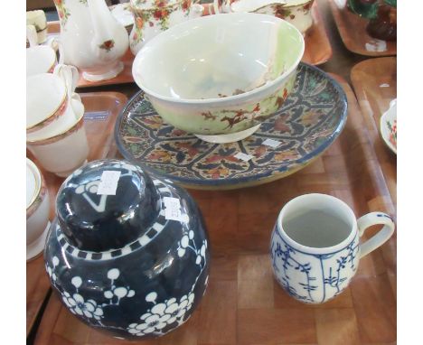 Tray of four items to include a navy blue and white ginger jar with two blue circles to the base, small blue and white barrel