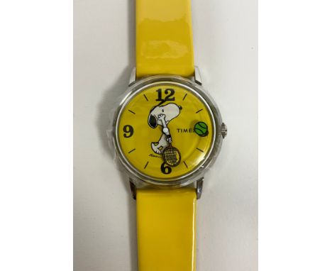 A Timex limited edition 'Snoopy Tennis' wristwatch, yellow dial and strap, stainless steel 34mm diameter case, tennis ball se